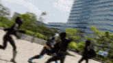 a blurry picture of a group of people walking in front of a building