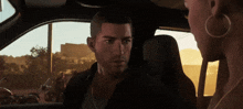 a man and a woman are sitting in a car and talking