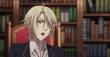 a blonde anime character is sitting in a chair in front of a bookshelf in a library .