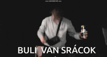 a blurred image of a person with the words " buli van srakok " written on the bottom