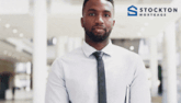 a stockton mortgage ad with a man pointing at it