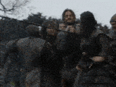 a man is chained to a woman in a crowd