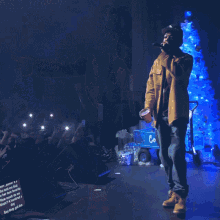 Performing On Stage Wiz Khalifa GIF - Performing On Stage Wiz Khalifa Pointing On Fans GIFs