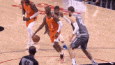 a basketball player wearing a number 3 jersey is dribbling the ball