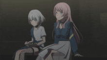 two anime girls are sitting next to each other with one covering her mouth with her hand
