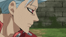 a close up of a person 's face with red eyes