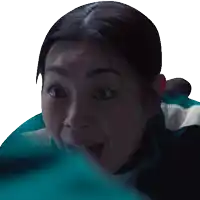 a close up of a woman with her mouth open