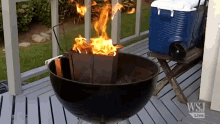 Playing With Wood Fire In Your Backyard. GIF