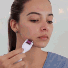 Acne Face Massage GIF - Acne Face Massage Roller GIFs