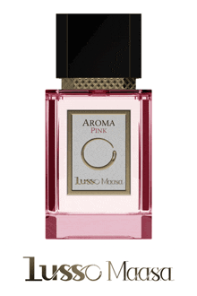 a bottle of lusso maasa aroma pink perfume on a white background