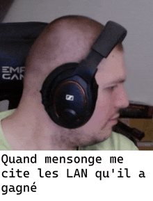 a man wearing a pair of headphones with the letter s on them