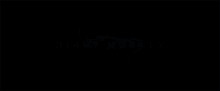 a dark background with night monkey written in blue
