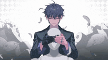 a man in a suit is covering his eyes with a mask surrounded by feathers