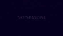 a gold capsule is sitting on a white table