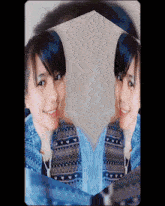 a picture of a girl with blue hair and a patterned shirt