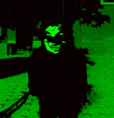 a green and black image of a person with a sword .