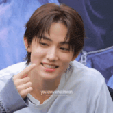 a close up of a person with the words " you know what i mean " on the bottom