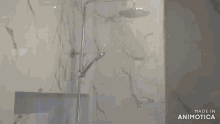 a woman in a black shirt is standing in a bathroom with the words made in animotica on the bottom