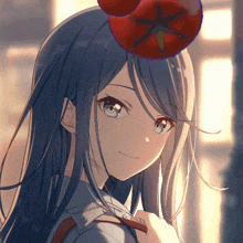 a girl with a tomato on her head