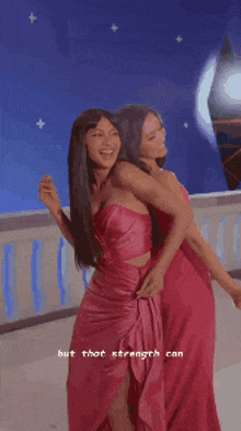 two women in pink dresses are hugging each other with the words but that strength can be seen in the background