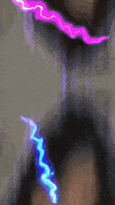 a woman taking a picture of herself with lightning coming out of her hair