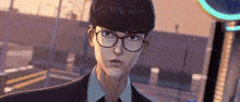 a man wearing glasses and a suit stands in front of a building