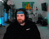 a man wearing a black hoodie with the word originals on it