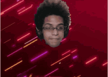 a man with glasses and headphones is surrounded by glowing lines .