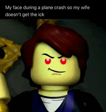a picture of a lego man with a caption that says my face during a plane crash so my wife