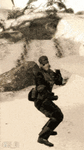 a man in a military uniform is standing in the snow with the numbers mbj 01 above him