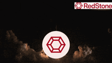 a rocket is being launched with a redstone logo in the foreground