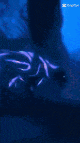 a gif of a person laying on a bed with a caption that says capcut