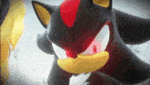 a close up of shadow the hedgehog 's face with red eyes