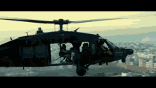 black hawk down helicopter flying sky city