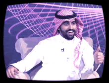 a man with a beard is giving a thumbs up on a tv screen