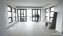 a room with a lot of windows and the words made in animotica at the bottom