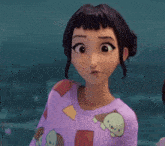 a close up of a cartoon character wearing a purple shirt with a dog on it .