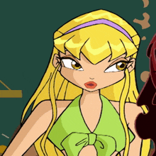 a cartoon girl with blonde hair and a green top with a bow