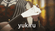 a woman holding another woman 's hand with the word yukiru written on the bottom