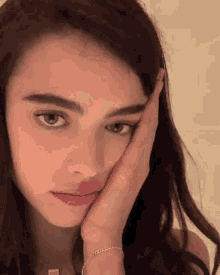 Margaret Qualley Hand On Face GIF - Margaret Qualley Hand On Face Idk GIFs