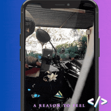 a phone with a reason to feel written on the screen