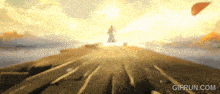 a gif from gifrun.com shows a person walking on a bridge
