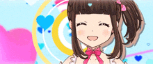 a girl with brown hair and a pink bow on her head is smiling
