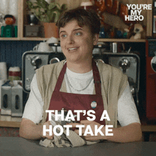 a woman in an apron says " that 's a hot take " while sitting at a counter