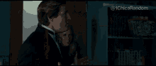 a man and a woman are standing next to each other in a dark room with the hashtag @ 1chica random on the bottom