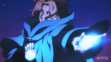 a woman in a blue robe is holding a blue light in her hand and the netflix logo is visible in the corner