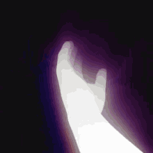 a white hand is reaching out in the dark with a purple background