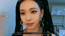 a close up of a woman 's face with the name karina on the bottom right