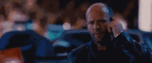 Not Looking At The Explosion - Jason Statham GIF - Expendables Jason Statham Explosion GIFs
