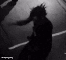 a black and white photo of a person with the words pinkpussyjimmy on the bottom right corner